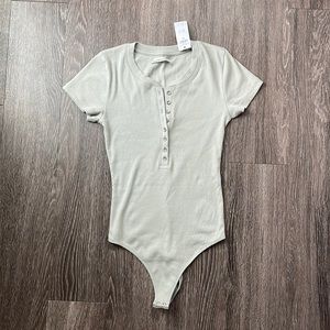 Abercrombie & Fitch light green bodysuit.
